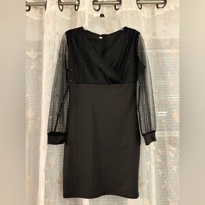 Black bodycon dress with mesh long sleeves and sparkles